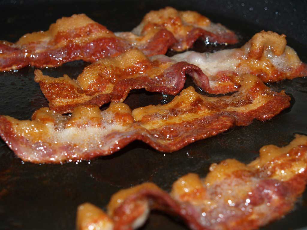 Bacon frying in its own grease